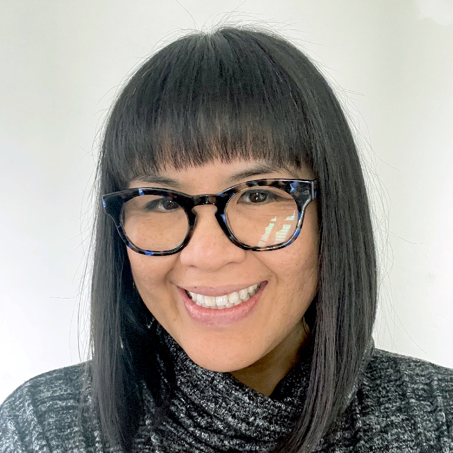 headshot of Kristine Go who is smiling and has dark straight hair with bangs and wears glasses